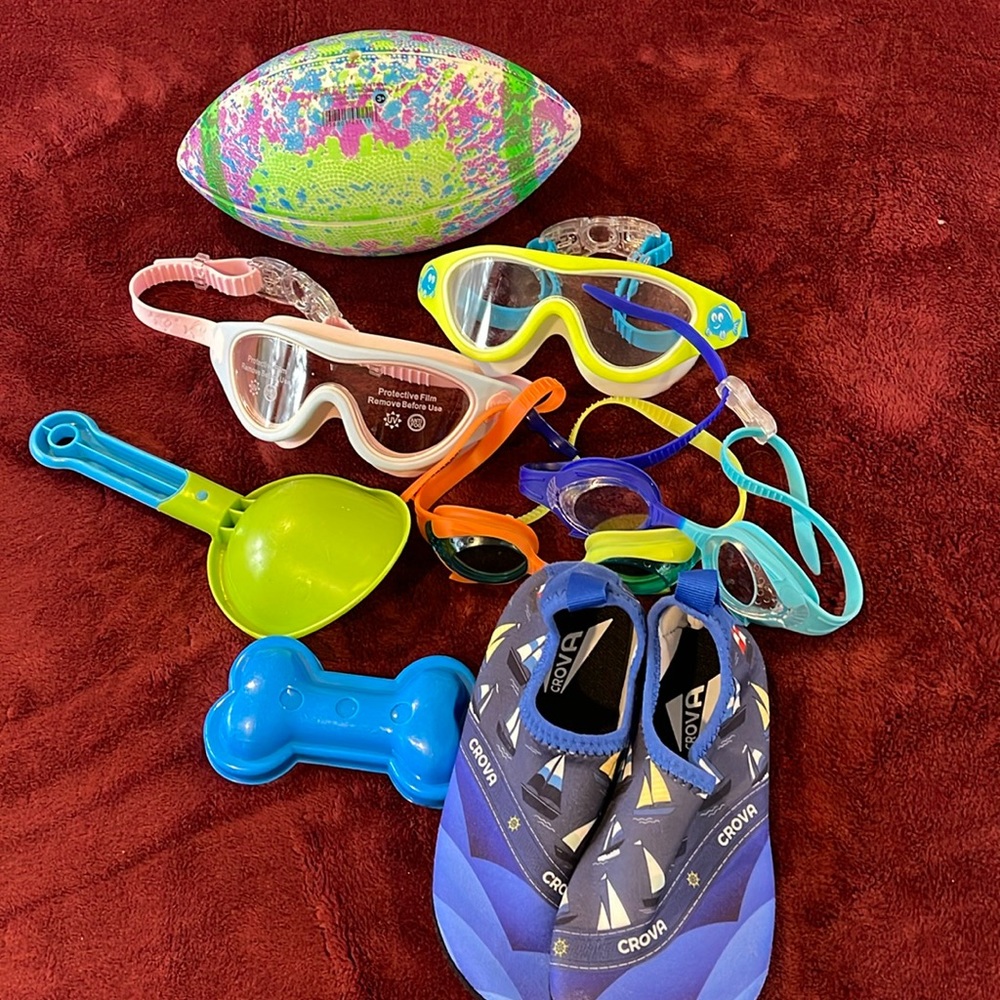 Swim goggles, nonslip water shoe and toys